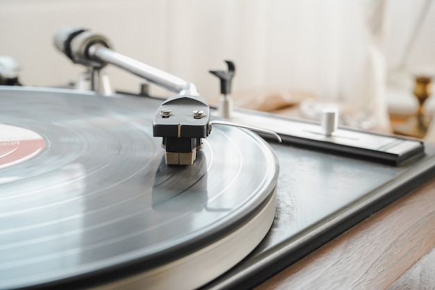 Premium Photo Close Up Vintage Music Record Player With A Black Vinyl