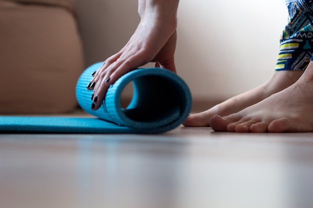 Close Up Woman Hands With Yoga Mat At Home Photo Premium Download