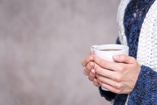 Free Photo Close Up Woman Holding Coffee Mug