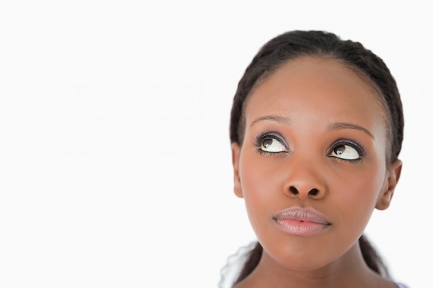 Premium Photo | Close up of woman's face looking upwards diagonally on ...