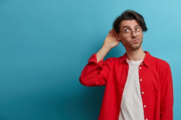 Close up on young handsome man isolated Free Photo