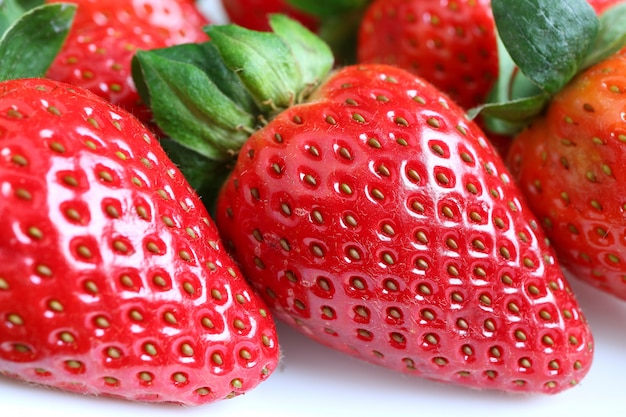 Premium Photo | Closed up vibrant red color fresh ripe strawberry fruits