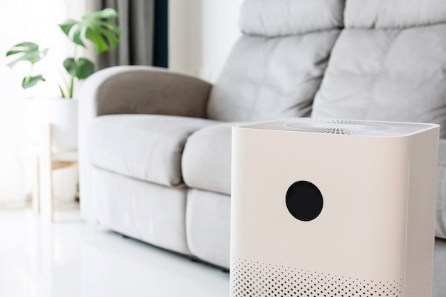 Premium Photo | Closeup of air purifier in living room at home for ...