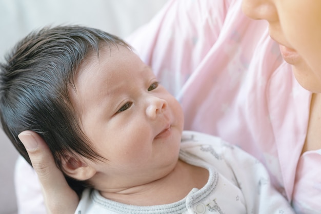 Close Up Baby Girl Hold 39 S Finger In A Room Happy Little Toddler