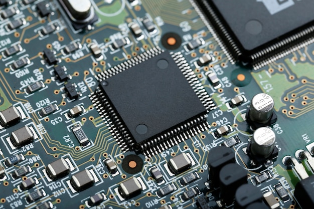 Free Photo | Closeup of electronic circuit board with cpu microchip ...