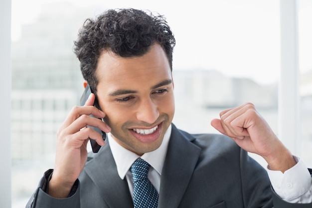 Premium Photo | Closeup of elegant businessman using cellphone