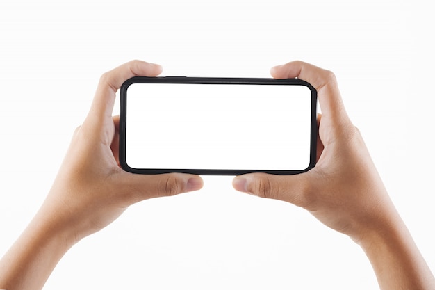 Closeup hand woman holding black smartphone blank screen isolated Premium Photo