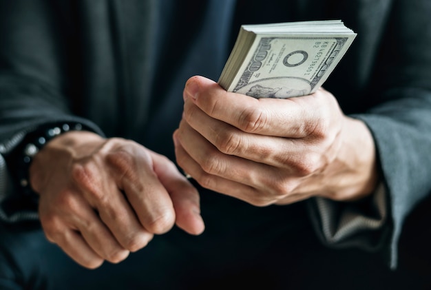 premium-photo-closeup-of-hands-holding-cash