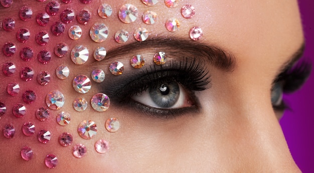 Free Photo | Closeup image of eyes with diamond makeup