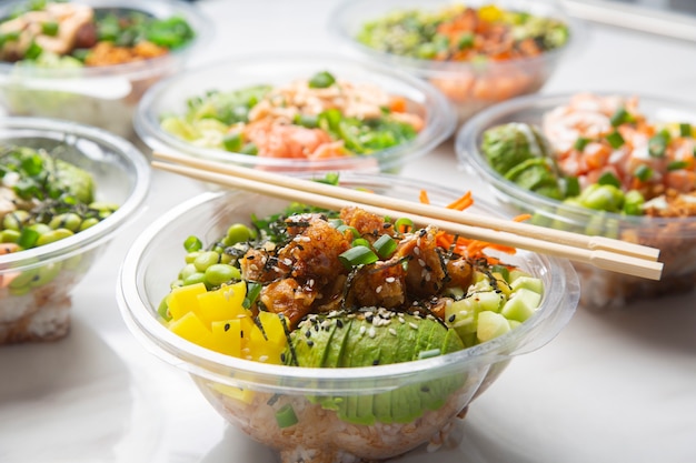 Premium Photo Closeup Of Japanese Takeaway Food Poke Bowls