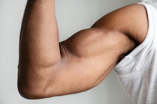 黒人の筋肉の腕のクローズアップ 無料の写真