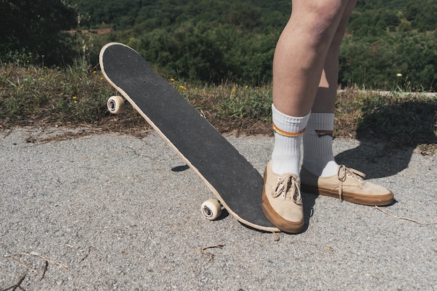 Free Photo | Closeup of a person skateboarding in a park under the ...