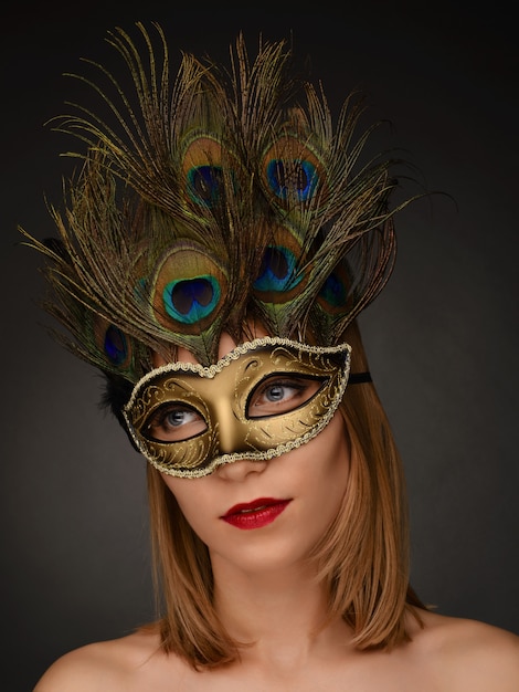 Premium Photo | Closeup portrait of beautiful woman with carnival mask