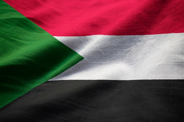 Closeup of ruffled sudan flag, sudan flag blowing in wind Premium Photo