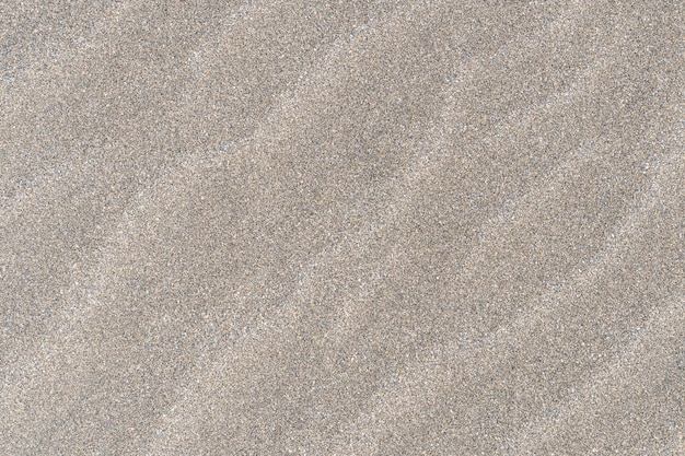 Premium Photo | Closeup of sand pattern of a beach in the sunny day