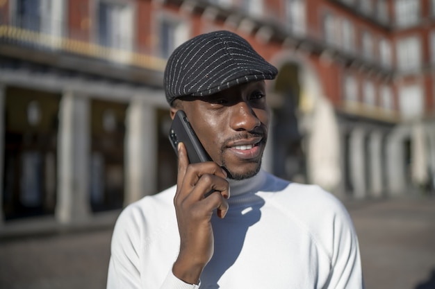 Free Photo | Closeup shot of a black man wearing a hat and a turtleneck ...