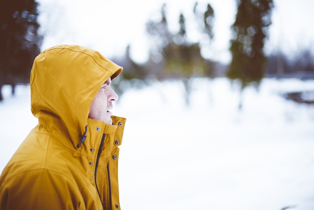 Free Photo | Closeup shot of a male wearing a yellow winter jacket