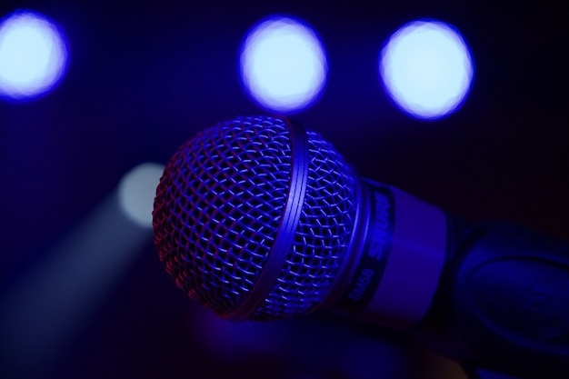 Free Photo | Closeup shot of a microphone set on a stage during an ...