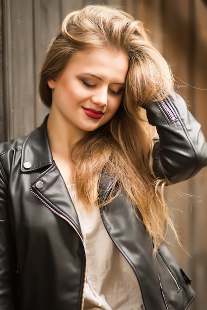 Premium Photo Closeup Shot Of A Woman With Lush Blonde Hair Posing With Closed Eyes 