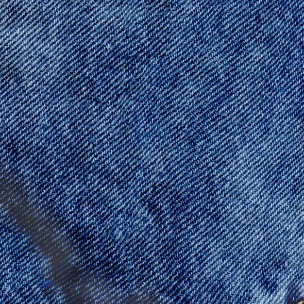 Premium Photo | Closeup view blue clean denim texture. blue torn jeans ...