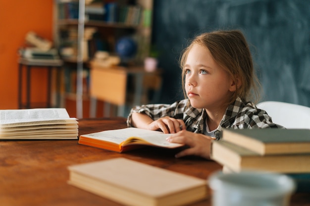 Premium Photo | Closeup view of focused pupil school girl kid listening ...