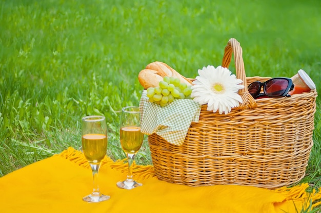 Premium Photo | Closeup of wine glasses on the yellow cover, picnic ...