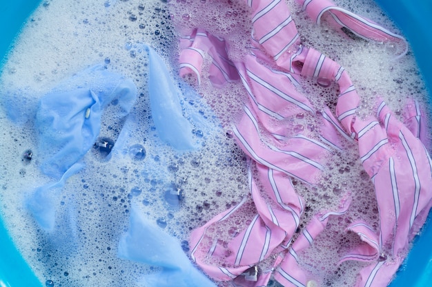 Premium Photo | Clothes soak in powder detergent water dissolution