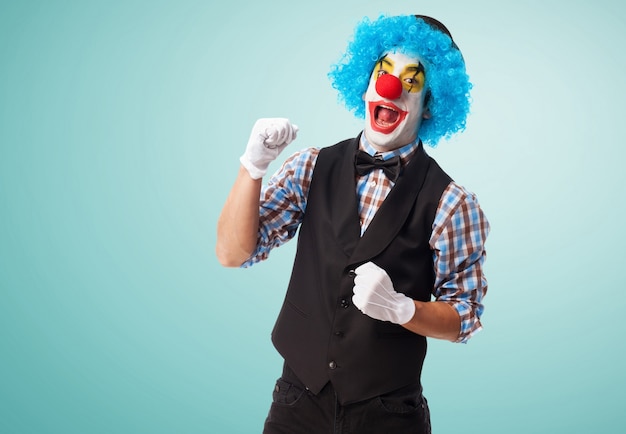 Free Photo | Clown smiling with a fist high