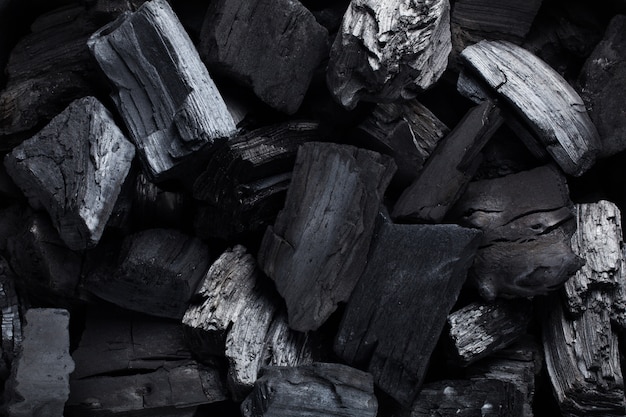 Premium Photo | Coal mineral black as a cube stone.