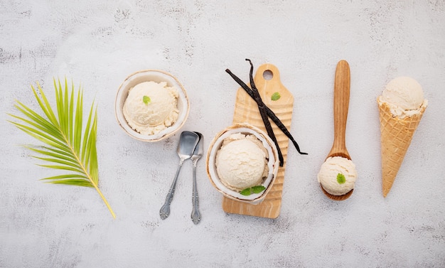 Premium Photo Coconut Ice Cream Flavours In Half Of Coconut Setup On White Stone Background Summer And Sweet Menu Concept