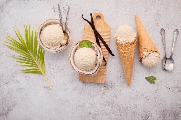 Premium Photo Coconut Ice Cream Flavours In Half Of Coconut Setup On White Stone