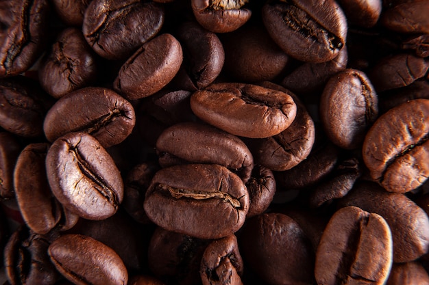 Coffee beans background. image macro good backgroud idea Premium Photo