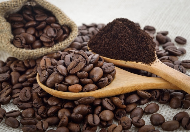 Premium Photo | Coffee beans and coffee powder