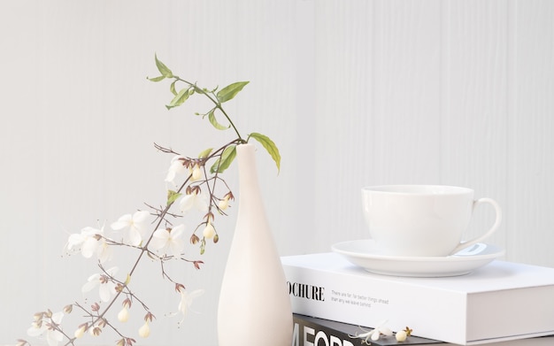 Download Premium Photo Coffee Cup On Black And White Books Mock Up And Beautiful Flower In Modern Vase Set On Concrete Table With White Wood Background