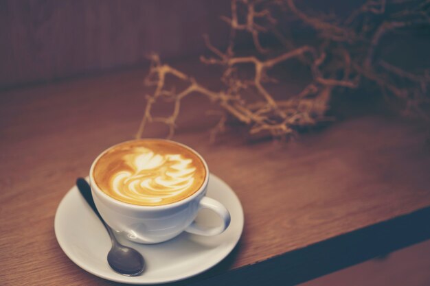 コーヒーカフェラテアート ビンテージフィルター画像 プレミアム写真
