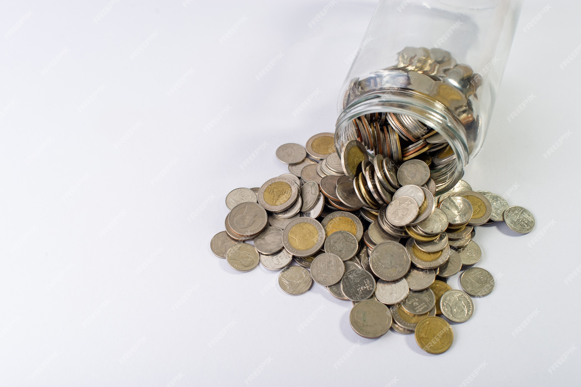 Premium Photo | Coins in a jar