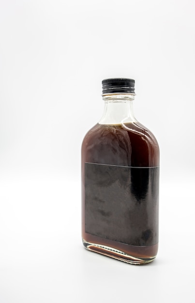 Download Premium Photo Cold Brew Coffee In Glass Bottle With Black Cap Isolated On White
