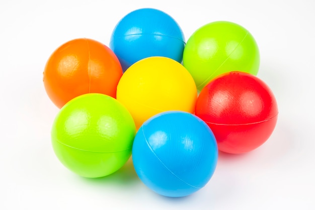 Premium Photo | Colored plastic balls toys isolated