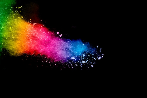 パステルパウダー爆発のカラフルな背景 黒い背景に虹色のほこりスプラッシュ プレミアム写真
