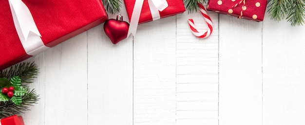 Premium Photo | Colorful christmas gift boxes on white wood banner ...