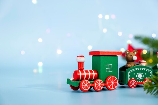 2022 Steam Christmas Backgrounds Premium Photo | Colorful Christmas Train With Fir Tree Branches With  Christmas Lights On Blue Background. Coming Soon New Year 2022 Or Merry  Christmas Holidays Design With Copy Space.