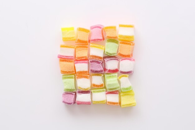 Premium Photo | Colorful cube jelly candy isolated in white background