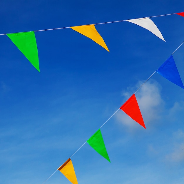 Premium Photo | Colorful flags in the sky.