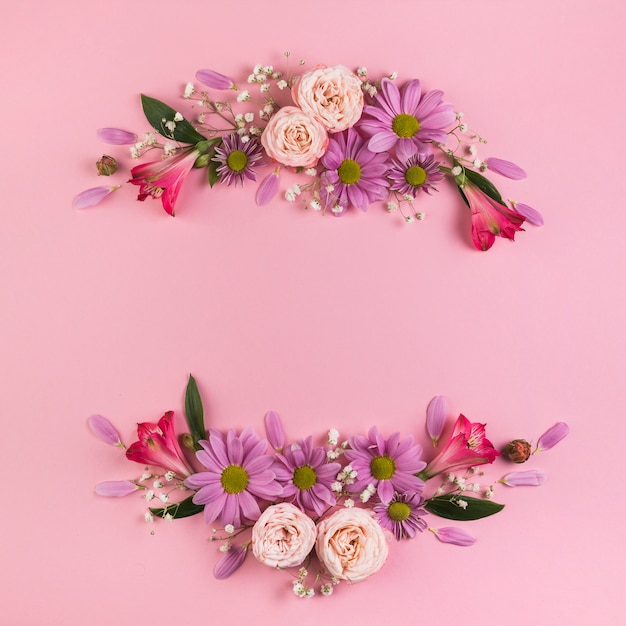 Free Photo | Colorful flower decoration on pink background for festive backdrop