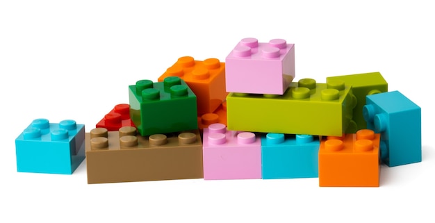 Premium Photo | Colorful plastic toy building blocks isolated on white