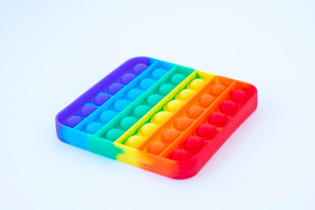 Premium Photo | Colorful rainbow poppit game. silicone fidget close-up ...