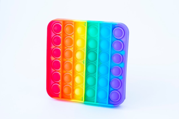 Premium Photo | Colorful rainbow poppit game. silicone fidget close-up ...