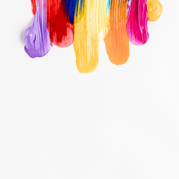 Colorful smeared paint on white background Photo | Free Download