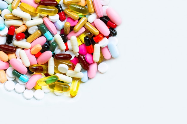 Colorful Tablets With Capsules And Pills On White