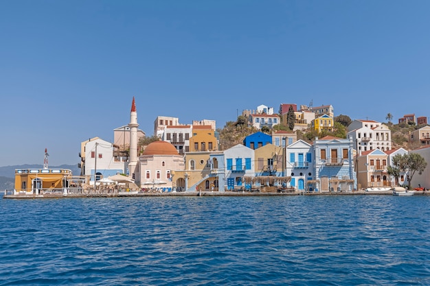 Colorful waterfront buildings of the greek island kastellorizo Premium Photo